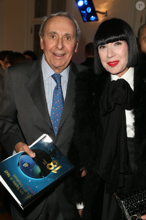 Exclusif - Maître Poulain et Chantal Thomass à la 18eme édition de la vente aux enchères des Sapins de Noël des créateurs a l'hôtel Salomon de Rothschild à Paris, le 9 décembre 2013.