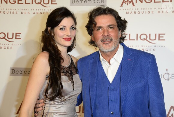 Christophe Barratier et sa compagne Gwendoline lors de la première du film Angélique à Paris, le 16 décembre 2013.