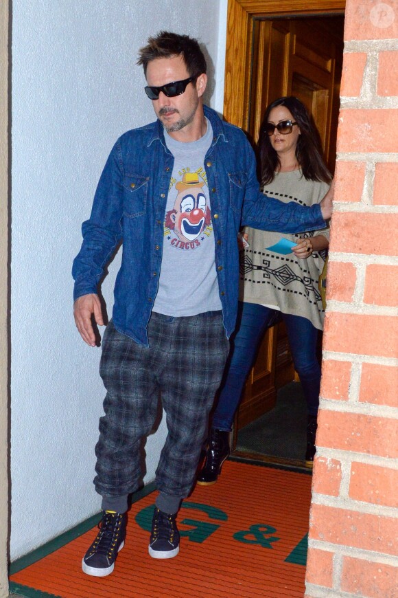 David Arquette et sa petite amie Christina McLarty (enceinte) sortent d'un rendez-vous médical à Los Angeles, le 16 décembre 2013.