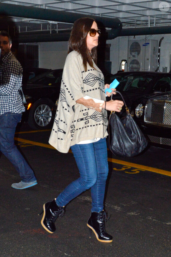 David Arquette et sa petite amie Christina McLarty (enceinte) dans les rues de Los Angeles, le 16 décembre 2013.