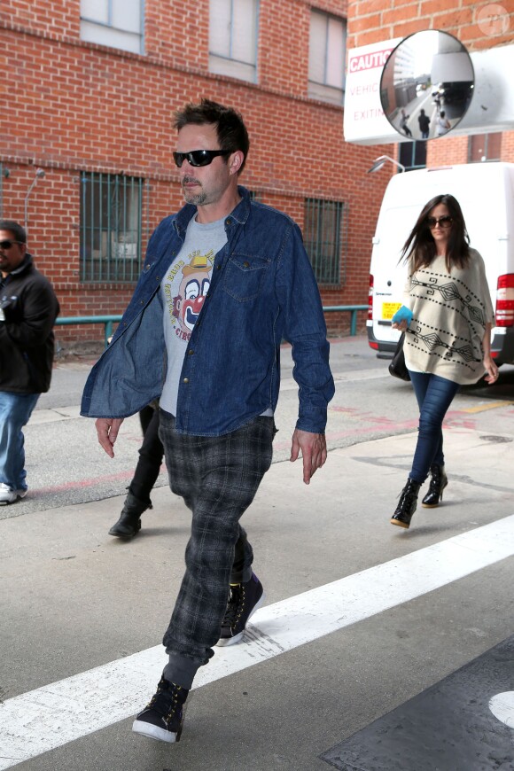 David Arquette et sa petite amie Christina Mclarty (enceinte) à Los Angeles, le 16 décembre 2013.