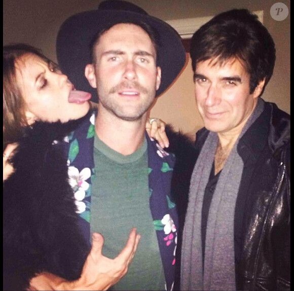 David Copperfield avec Adam Levine et Behati Prinsloo fête le Nouvel An le 31 décembre 2013