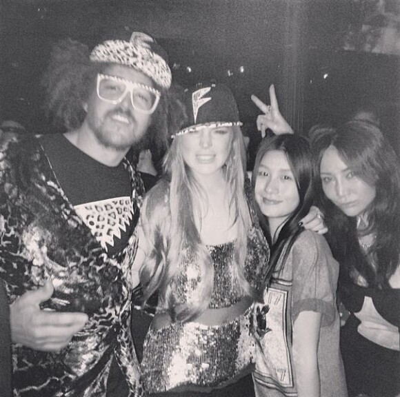 Lindsay Lohan fait la fête avec Redfoo, à Shanghai, le 6 janvier 2014.