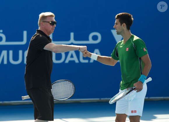 Boris Becker et Novak Djokovic lors du tournoi d'Abu Dhabi le 27 décembre 2013 à Abu Dhabi