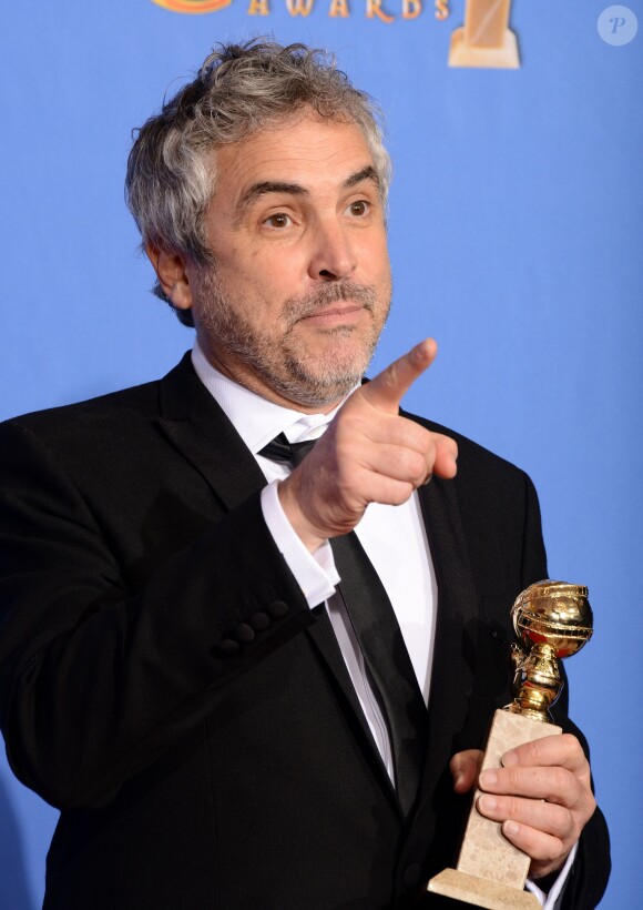 Alfonso Cuaron, meilleur réalisateur pour Gravity, lors des Golden Globes à Los Angeles le 12 janvier 2014