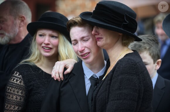 La famille de la comtesse Anne-Dorte de Rosenborg en deuil à ses obsèques célébrées à l'église de Lyngby, au nord de Copenhague, le 9 janvier 2014.