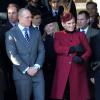 Zara Phillips, enceinte de huit mois, et son mari Mike Tindall à Sandringham le 25 décembre 2013 avec la famille royale pour la messe de Noël. Le couple a eu une petite fille le 17 janvier 2014.