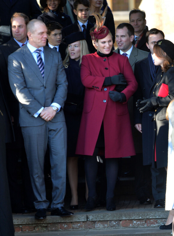 Zara Phillips, enceinte de huit mois, et son mari Mike Tindall à Sandringham le 25 décembre 2013 avec la famille royale pour la messe de Noël. Le couple a eu une petite fille le 17 janvier 2014.