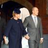 Zara Phillips, enceinte, et Mike Tindall au palais Saint James le 23 octobre 2013 pour le baptême du prince George de Cambridge