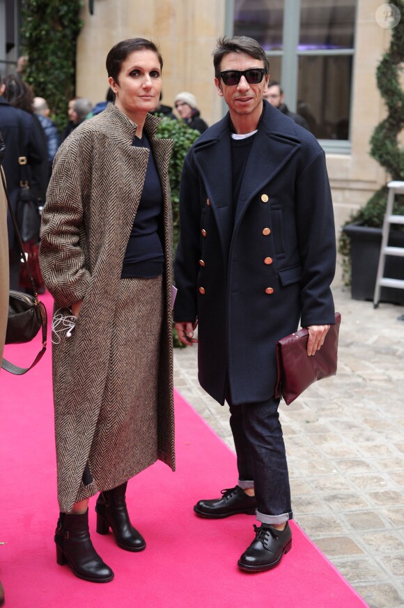 Maria Grazia Chiuri et Pier Paolo Piccioli, directeurs artistiques de Valentino, au défilé Schiaparelli Haute couture printemps-été 2014 à Paris, le 20 janvier 2014.