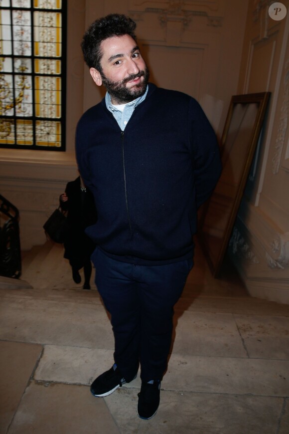 Mouloud Achour assiste au défilé haute couture printemps-été 2014 de Jean Paul Gaultier, dans son atelier situé dans le 3e arrondissement. Paris, le 22 janvier 2014.