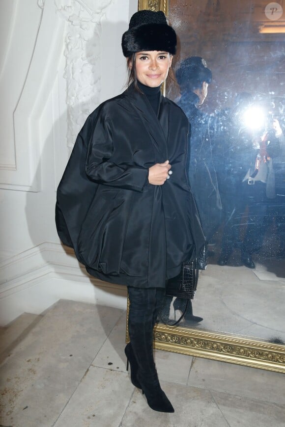 Miroslava Duma assiste au défilé haute couture printemps-été 2014 de Jean Paul Gaultier, dans son atelier situé dans le 3e arrondissement. Paris, le 22 janvier 2014.