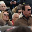 Arnold Schwarzenegger et Heather Milligan assistent à une compétition de ski à Kitzbuehel, en Autriche, le 25 janvier 2014.