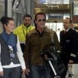 Arnold Schwarzenegger et sa nouvelle compagne Heather Milligan a l'aéroport de Innsbruck, le 25 janvier 2014.