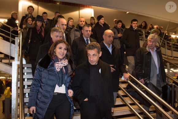 Carla Bruni et Nicolas Sarkozy arrivent à Lyon le 23 janvier 2013.