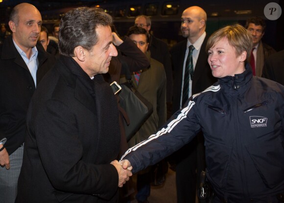 Carla Bruni et Nicolas Sarkozy arrivent à Lyon le 23 janvier 2013.