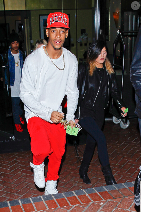 Le rappeur controversée Lil Za en compagnie de la jeune Kylie Jenner à la sortie du Sunset Marquis Hotel à West Hollywood, le 2 février 2014.
