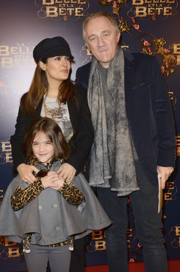 François-Henri Pinault avec sa femme Salma Hayek et leur fille Valentina à l'avant-première du film "La Belle et La Bête" à Paris le 9 février 2014.
