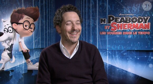 Guillaume Gallienne, hilare en interview avec Purepeople.com pour le film d'animation M. Peabody & Sherman.
