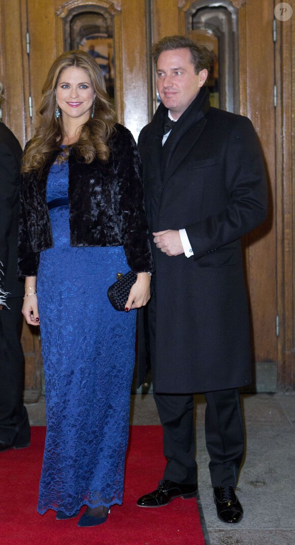 La princesse Madeleine de Suède, enceinte, et son mari Chris O'Neill à Stockholm le 19 décembre 2013 pour la soirée de gala des 70 ans de la reine Silvia.