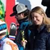 Bode Miller et sa souriante Morgan Beck après l'épreuve du Super Combiné aux Jeux olympiques de Sotchi au Rosa Khutor Alpine Center de Sochi, le 13 février 2014