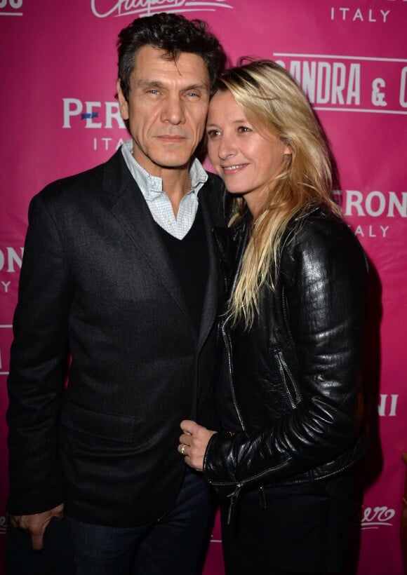 Marc et Sarah Lavoine lors de la contre-soirée de la Saint-Valentin par l'agence Sandra & CO au club Le Chapelier à Paris, le 14 février 2014.