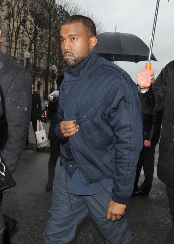 Kanye West arrive à L'Observatoire pour assister au défilé Balenciaga automne-hiver 2014-2015. Paris, le 27 février 2014.