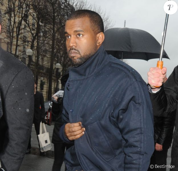 Kanye West arrive à L'Observatoire pour assister au défilé Balenciaga automne-hiver 2014-2015. Paris, le 27 février 2014.
