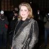 Catherine Deneuve arrive à l'École Nationale des Beaux-Arts pour le défilé Lanvin automne-hiver 2014-2015. Paris, le 27 février 2014.