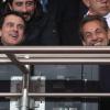 Manuel Valls et Nicolas Sarkozy lors du match entre le Paris Saint-Germain et l'Olympique de Marseille au Parc des Princes à Paris, le 2 mars 2014