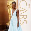 Lupita Nyong'o a ébloui dans une robe Prada, pour assister à la 86e cérémonie des Oscars à Hollywood, le 2 mars 2014.