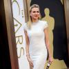Naomi Watts figure dans le palmarès des stars les mieux habillées de la 86e cérémonie des Oscars à Hollywood, le 2 mars 2014. La comédienne est arrivée dans une robe blanche Cakvin Klein