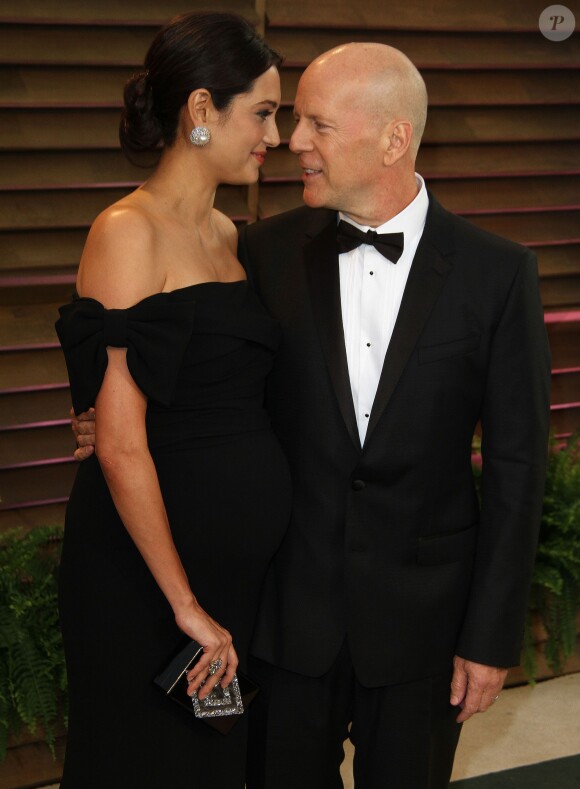 Bruce Willis et sa femme Emma Heming, enceinte, à la soirée Vanity Fair après les Oscars à Los Angeles, le 2 mars 2014.