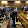 Oscar Pistorius lors du premier jour de procès devant la Haute Cour de Pretoria où il doit répondre du meurtre de Reeva Steenkamp, le 3 mars 2014