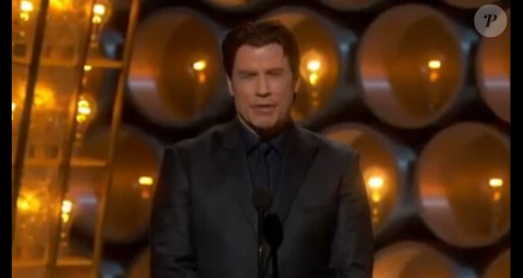 John Travolta sur la scène des Oscars 2014.