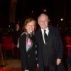 Jean-Marc Ayrault et sa femme Brigitte lors de la 9e cérémonie des Globes de Cristal au Lido à Paris, le 10 mars 2014.