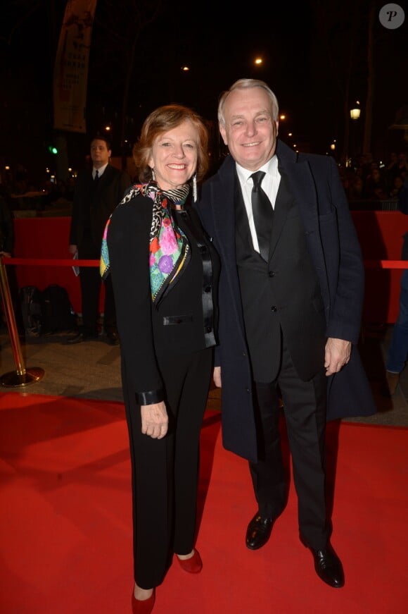 Jean-Marc Ayrault et sa femme Brigitte lors de la 9e cérémonie des Globes de Cristal au Lido à Paris, le 10 mars 2014.