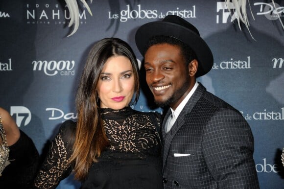 Corneille et son épouse son épouse Sofia de Medeiros lors de la 9e cérémonie des Globes de Cristal au Lido à Paris, le 10 mars 2014.