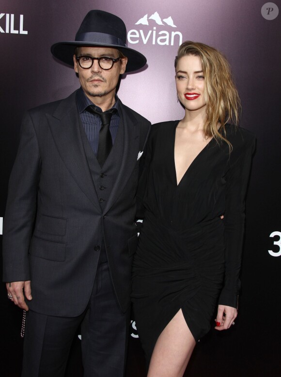 Johnny Depp et sa fiancée Amber Heard à Hollywood, le 12 février 2014.