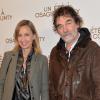 Olivier Marchal et sa femme Catherine lors de l'avant-première du film "Un été à Osage County" à l'UGC Normandie à Paris, le 13 février 2014