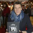 Le chanteur Marc Lavoine - 34e édition du Salon du livre à Paris, Porte de Versailles, le 23 mars 2014.
