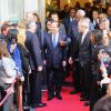 François Hollande et sa ministre Yamina Benguigui visitent le siège de l'Organisation Internationale de la Francophonie à Paris, en compagnie de son secrétaire général Abdou Diouf, dans le cadre de Journée Internationale de la Francophonie, le 20 mars 2014.