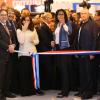 La présidente d'Argentine Cristina Kirchner, le Premier ministre Jean-Marc Ayrault et Yamina Benguigui inaugurent la 34e édition du Salon du livre à la Porte de Versailles à Paris le 20 mars 2014.