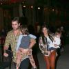Scott Disick, Kourtney Kardashian et leurs deux enfants Mason et Penelope à Calabasas, Los Angeles. Le 4 mars 2014.