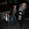 Nicole Kidman, son mari Keith Urban et leurs filles Faith Margaret et Sunday Rose arrivent à l'aéroport LAX de Los Angeles. Le 26 mars 2014