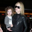 L'actrice australienne Nicole Kidman, son mari Keith Urban et leurs filles Faith Margaret et Sunday Rose arrivent à l'aéroport LAX de Los Angeles. Le 26 mars 2014