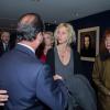 Jean-Louis Livi, François Hollande, Sandrine Kiberlain et Sabine Azéma lors de la présentation du film Aimer, boire et chanter à Paris le 10 mars 2014