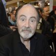 Le chanteur Michel Delpech à la 34e édition du Salon du Livre à Paris, Porte de Versailles, le 22 mars 2014