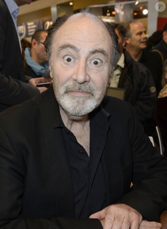 Le chanteur Michel Delpech à la 34e édition du Salon du Livre à Paris, Porte de Versailles, le 22 mars 2014