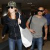 Stacy Keibler et Jared Pobre arrivant à l'aéroport de Los Angeles le 7 décembre 2013